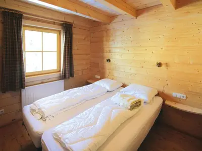 Ein Bett oder Betten in einem Zimmer der Unterkunft Chalet in Königsleiten near Hohe Tauern