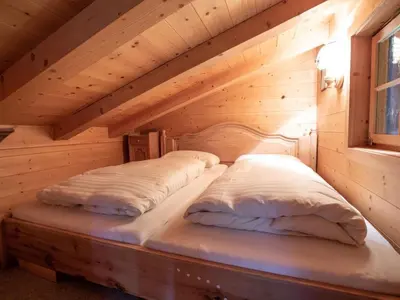 Ein Bett oder Betten in einem Zimmer der Unterkunft Chalet in Austria near Ski Lift & Forest