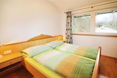 Ein Bett oder Betten in einem Zimmer der Unterkunft Chalet in Mühltal near Kitzbühel Ski Slopes