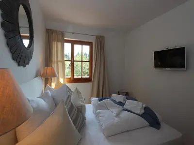Ein Bett oder Betten in einem Zimmer der Unterkunft Chalet in Mittersill near Jochberg Ski Lift