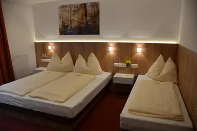 Ein Bett oder Betten in einem Zimmer der Unterkunft Komfort Appartements Talbach