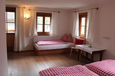 Ein Bett oder Betten in einem Zimmer der Unterkunft Uhlerhof
