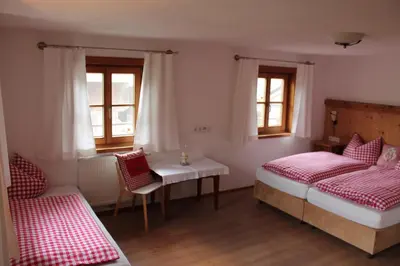 Ein Bett oder Betten in einem Zimmer der Unterkunft Uhlerhof