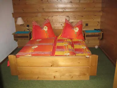 Ein Bett oder Betten in einem Zimmer der Unterkunft Apartment Hölzlbauer
