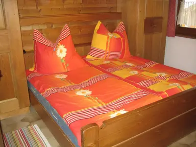 Ein Bett oder Betten in einem Zimmer der Unterkunft Apartment Hölzlbauer