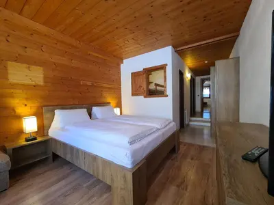 Ein Bett oder Betten in einem Zimmer der Unterkunft Aparthotel Buchauer-Tirol