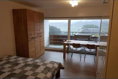 Ein Bett oder Betten in einem Zimmer der Unterkunft Berghof Appartement Top 22