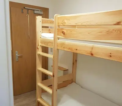 Ein Etagenbett oder Etagenbetten in einem Zimmer der Unterkunft Berghof Appartement Top 22
