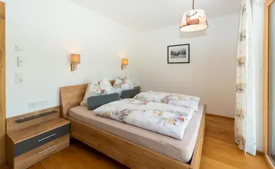 Ein Bett oder Betten in einem Zimmer der Unterkunft Ferienwohnung App. MOUNTAIN VIEW