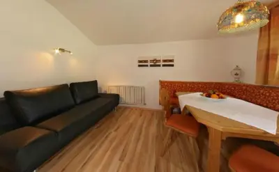 Ein Sitzbereich in der Unterkunft Ferienwohnungen Haaser