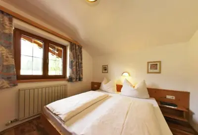 Ein Bett oder Betten in einem Zimmer der Unterkunft Ferienwohnungen Haaser