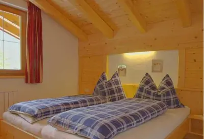 Ein Bett oder Betten in einem Zimmer der Unterkunft Ferienwohnungen Haaser