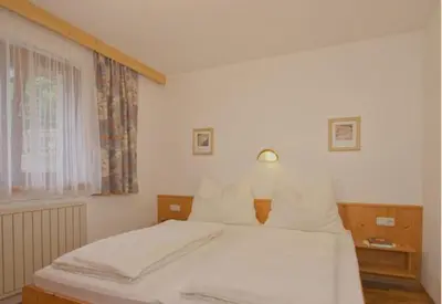 Ein Bett oder Betten in einem Zimmer der Unterkunft Ferienwohnungen Haaser