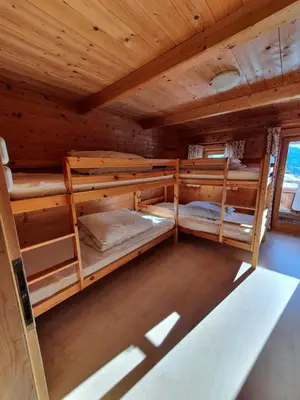 Ein Bett oder Betten in einem Zimmer der Unterkunft Zillertaler Sennhuette