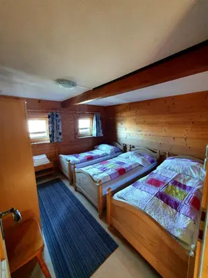 Ein Bett oder Betten in einem Zimmer der Unterkunft Zillertaler Sennhuette