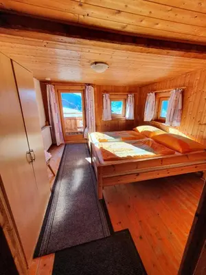 Ein Bett oder Betten in einem Zimmer der Unterkunft Zillertaler Sennhuette