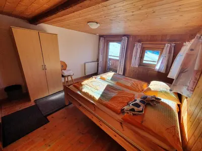 Ein Bett oder Betten in einem Zimmer der Unterkunft Zillertaler Sennhuette