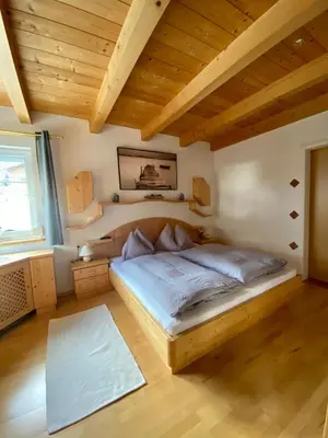 Ein Bett oder Betten in einem Zimmer der Unterkunft AlpenApartment mit NationalparkCard