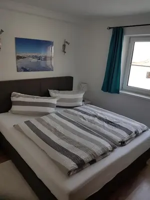 Ein Bett oder Betten in einem Zimmer der Unterkunft Appartement Haus Pichler