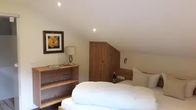 Ein Bett oder Betten in einem Zimmer der Unterkunft Gästehaus Pfister Maria