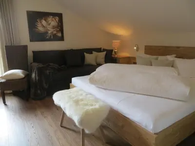 Ein Bett oder Betten in einem Zimmer der Unterkunft Gästehaus Pfister Maria