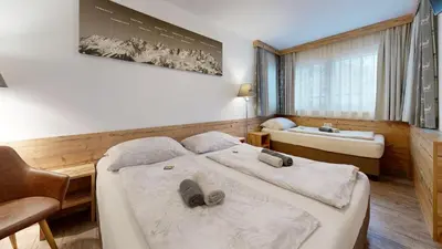 Ein Bett oder Betten in einem Zimmer der Unterkunft Pension Rainer