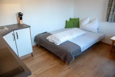 Ein Bett oder Betten in einem Zimmer der Unterkunft Ferienwohnung Kant