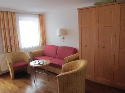 Ein Sitzbereich in der Unterkunft Alpengasthof Filzstein