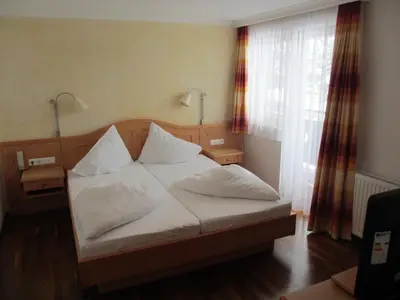Ein Bett oder Betten in einem Zimmer der Unterkunft Alpengasthof Filzstein