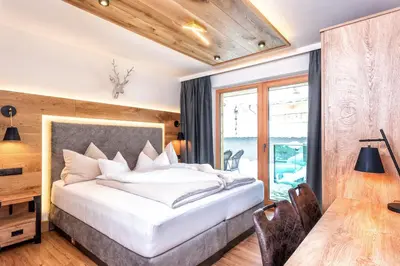 Ein Bett oder Betten in einem Zimmer der Unterkunft Sruh Prime Apart