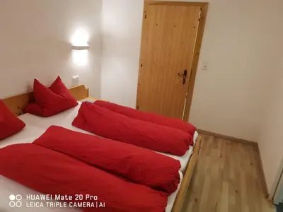 Ein Bett oder Betten in einem Zimmer der Unterkunft Landhaus Mayr