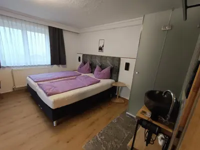 Ein Bett oder Betten in einem Zimmer der Unterkunft Landhaus Mayr