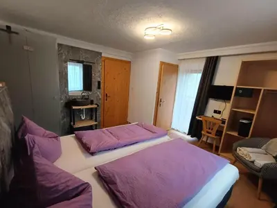 Ein Bett oder Betten in einem Zimmer der Unterkunft Landhaus Mayr