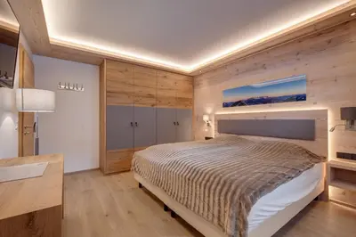 Ein Bett oder Betten in einem Zimmer der Unterkunft Villa Mountainview - Kirchberg bei Kitzbühel, Sauna, Kamin, nicht weit zu den Skiliften