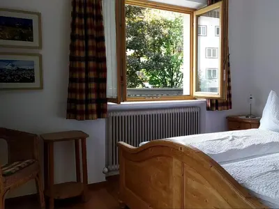 Ein Bett oder Betten in einem Zimmer der Unterkunft Gästehaus Maier