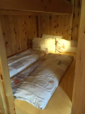 Ein Bett oder Betten in einem Zimmer der Unterkunft Almliesl HOLL-559