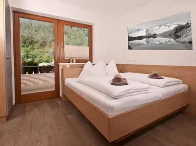 Ein Bett oder Betten in einem Zimmer der Unterkunft Landhaus Sabrina