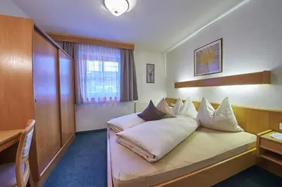 Ein Bett oder Betten in einem Zimmer der Unterkunft Lindlinghof