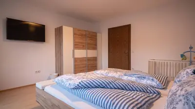 Ein Bett oder Betten in einem Zimmer der Unterkunft Ferienhaus Krismer