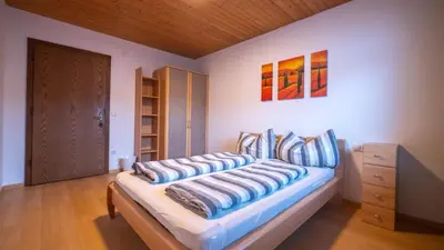 Ein Bett oder Betten in einem Zimmer der Unterkunft Ferienhaus Krismer