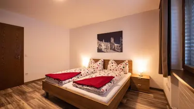 Ein Bett oder Betten in einem Zimmer der Unterkunft Ferienhaus Krismer