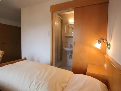 Ein Bett oder Betten in einem Zimmer der Unterkunft Chalet in Ellmau near Skiwelt Slopes