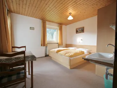 Ein Bett oder Betten in einem Zimmer der Unterkunft Chalet in Ellmau near Skiwelt Slopes