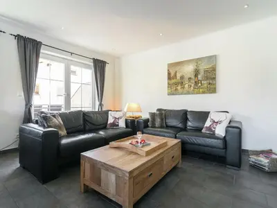 Ein Sitzbereich in der Unterkunft Holiday Home Brixen near Skiwelt Slopes