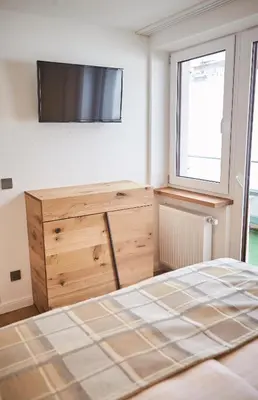 Ein Bett oder Betten in einem Zimmer der Unterkunft Saalbacher Perle Top 4