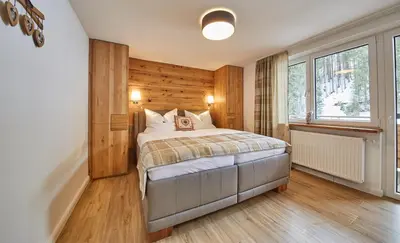 Ein Bett oder Betten in einem Zimmer der Unterkunft Saalbacher Perle Top 4