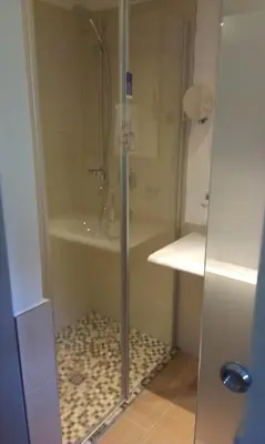 Ein Badezimmer in der Unterkunft Gästehaus die geislerin