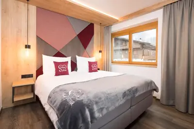 Ein Bett oder Betten in einem Zimmer der Unterkunft Haus Sylvia