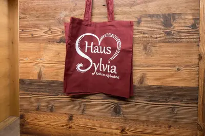 Ein Zertifikat, Auszeichnung, Logo oder anderes Dokument, das in der Unterkunft Haus Sylvia ausgestellt ist