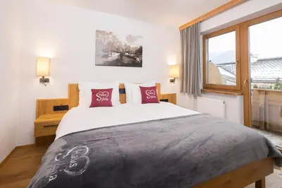 Ein Bett oder Betten in einem Zimmer der Unterkunft Haus Sylvia